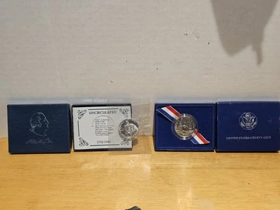 1982 d UNCIRC SILVER Washington Comm. &  1986 SILVER STATUE LIBERTY 1/2 DOLLAR - Image 1 of 4