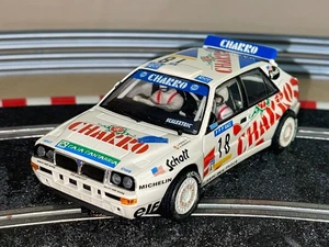 1399-Scalextric TecniToys LANCIA DELTA INTEGRALE #18 Charro RACC Schott slot car - Bild 1 von 3