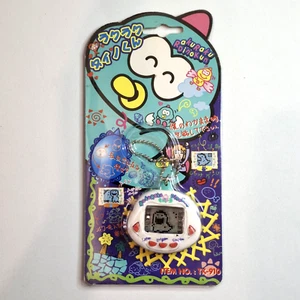 Raku Raku Dino Kun weiß virtuelles Haustier Tamagotchi Stil Japan LCD Spiel - Bild 1 von 7