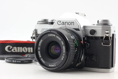 [Come nuova con cinturino] Canon AE-1 SLR 35mm fotocamera pellicola nuova FD 28mm f/2.8 dal GIAPPONE - Immagine 1 di 4