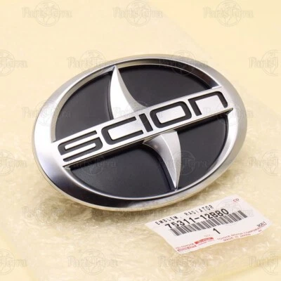 75311-12B80 OEM Toyota Scion parrilla del radiador delantero emblema satinado plateado 2010-2015 Foto 1 de 4
