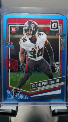 2023 Donruss Optic #8 CLARK PHILLIPS III Rookie RC Aqua Holo Prizm #’d /299 - Image 1 of 2
