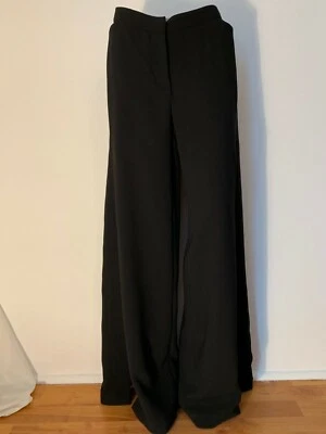 Pantalones YOANA BARASCHI únicos con abertura lateral Foto 1 de 4