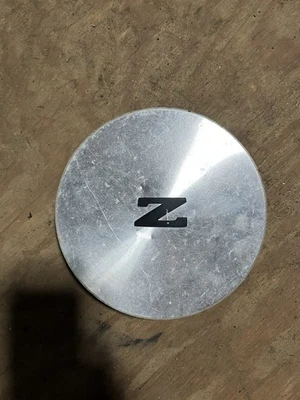 Cubierta de tapa central de rueda OEM 1984-1989 Nissan 300ZX 300 ZX Foto 1 de 2