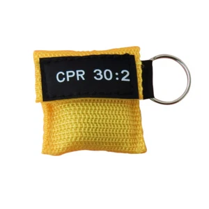 100PCS CPR MASK KEYCHAIN CPR FACE SHIELD YELLOW CPR 30:2 AED TRAINING - Picture 1 of 12