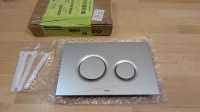 Placa de empuje redonda básica TOTO YT930#MS doble botón plateado mate para DuoFit en la pared Foto 1 de 3