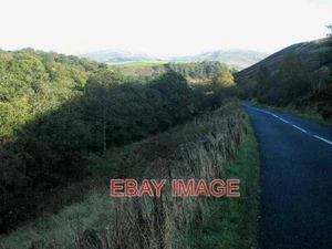FOTO THE ROAD TO THE MENNOCK PASS SOMBRAS PROFUNDAS PROYECTADAS POR UN SOL BAJO EN LA PARTE INFERIOR - Imagen 1 de 1