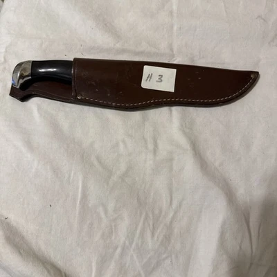 Cuchillo de caza dentado vintage CUTCO 1769 EE. UU. con funda de cuero años 70 Foto 1 de 3