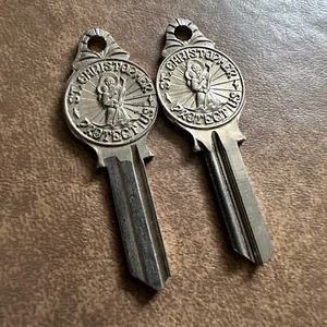 2x UNCUT ST.CHRISTOPHER PROTECT US EMBOSSED KEY BLANK YALE NOS NEW OLD STOCK - Picture 1 of 5