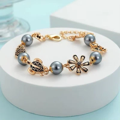 Pulsera/tobillera de inspiración hawaiana Foto 1 de 4