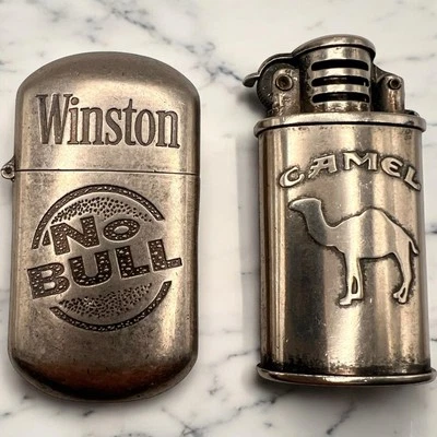 Lote de 2 encendedores de cigarrillos vintage Camel Winston sin Bull tamaño de bolsillo sin probar Foto 1 de 4