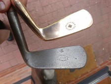 Pair of Forgan St. Andrews gutty era putters. 