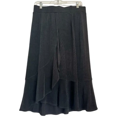 Falda midi Chico's Travelers negra resistente a las arrugas línea A con volantes centrales Foto 1 de 4