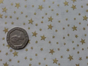 metre 135cm cotton fabric with bright gold stars on blue, green, red or ivory - Picture 1 of 4