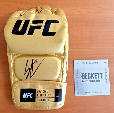 Donald Cowboy Cerrone Signed Autographed Gold UFC Fight Glove BAS Beckett COA - Image 1 of 4