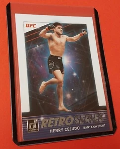 2022 Panini Donruss UFC HENRY CEJUDO Retro Series #8 MMA Champion Triple C - Foto 1 di 2