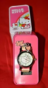 Hello Kitty Mädchenuhr mit Charms/Dose mit Lederband! Seltene neue Batterie - Bild 1 von 3
