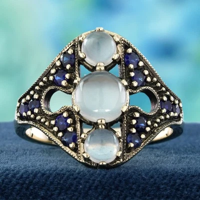 Anillo de tres piedras estilo vintage de piedra lunar natural y zafiro azul de oro de 9 quilates Foto 1 de 4