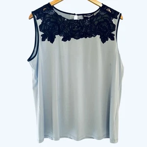 Karl Lagerfeld Paris Damen ärmellose Bluse XL blau Kunstleder Blumenbesatz - Bild 1 von 19