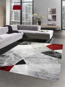 Abstrakter Wohnzimmer Teppich mit modernem marmorierten Wellen Rauten Design in - Bild 1 von 7