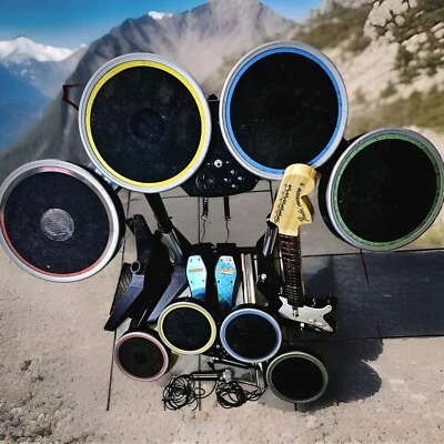 Wii Rock Band Bundle: (2)Drums, (1)Guitar, 2 Petals,(2) Mic's Estate Sale Untest - Image 1 of 4