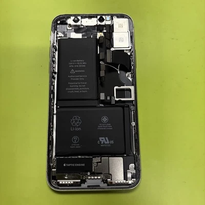 Repuesto Carcasa Completa iPhone X Marco Plateado Blanco con Piezas Pequeñas Parte Trasera agrietada Foto 1 de 4