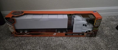 NewRay 1 Diecast Vehicles 43 Long Haul Trucker - Peterbilt Model 387 - Image 1 of 4