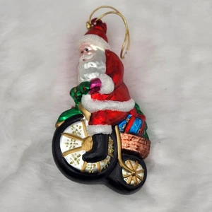 Adorno de Navidad de Papá Noel en una bicicleta de vidrio soplado - Imagen 1 de 3