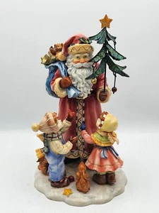 Papá Noel con niños y animales. Resina. 10,5" H pesado - Imagen 1 de 13