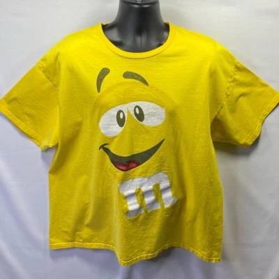 Camiseta amarela M&Ms Candy personagem bobo rosto gráfico 2009 manga curta 2XL - Imagem 1 de 4