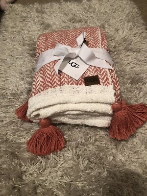 NEW UGG 50” x 70” Leigh Tassel Trim Herringbone Throw in Coral/Snow - Image 1 of 4
