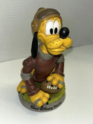 Estatueta aposentada Disney Pluto capacete de couro antigo futebol bobblehead Nodder  - Imagem 1 de 4