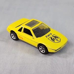 Pontiac Fiero 1984 vintage Hot Wheels amarillo fundido a presión como nuevo - Imagen 1 de 8