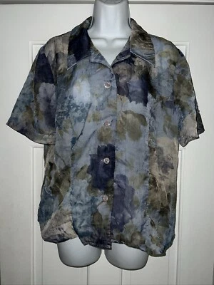 Blusa Miss Dorby 14 Top Manga Corta Floral Transparente Abotonada  Foto 1 de 4