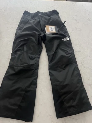 Pantalones de esquí North Face para niños. Negro. Nuevo con etiquetas.  mediano 10 Foto 1 de 4