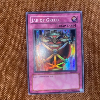 LP - MISPRINT - Jar of Greed - Foil Shift - LON-047 - Yu-Gi-Oh - Image 1 of 4
