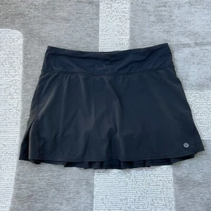 Lululemon schwarz Play Off The Pleats sportlich Mid Rise Rock Größe 6 Yoga Training - Bild 1 von 11