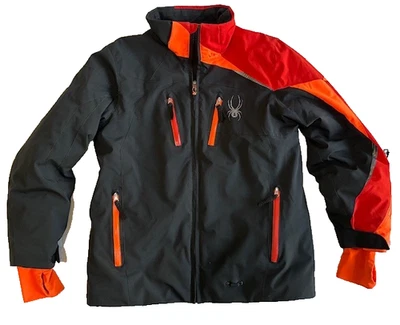 Chaqueta SPYDER 12 Jóvenes Niños Negro Naranja Snowboard Esquí Invierno Agujeros para el Pulgar Foto 1 de 4
