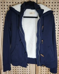 Hollister marineblaue Sherpa-gefütterte Jacke mit Kapuze und durchgehendem Reißverschluss und Knopf—Damen Small - Bild 1 von 9