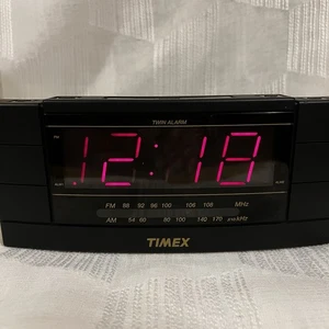 TIMEX AM/FM TWIN ALARM CLOCK RADIO, BLACK: RED LCD DISPLAY: MODEL NO. T314B - Picture 1 of 6