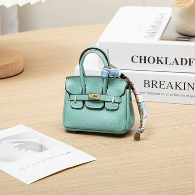 Auriculares Auriculares Bolsa Auriculares Imitación Cuero Llavero Coche Dije Bolso Llavero Foto 1 de 4