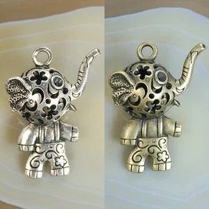 Colgante con dijes de elefante 3D de bronce plateado de 28x38 mm - Imagen 1 de 3