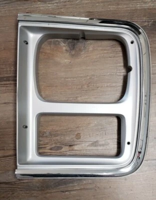 Chevrolet van G10 G20 1985-1991 Driver Side Headlamp bezel gm oem  - Image 1 of 4