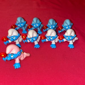 Modellino vintage bambino puffo con sonaglio in PVC (a scelta) rosa blu bianco - Foto 1 di 7