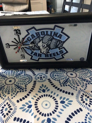 UNC Tarheels Wall Clock 6.5 “x 12.75" - 2AA battery operated Cover
