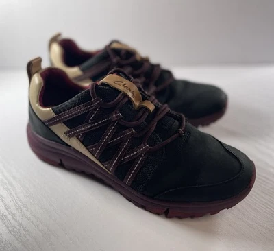 Zapatillas para mujer Clarks Trigenic Flex 7,5 EE. UU. Borgoña Negro Tostado Casi Como Nuevas Foto 1 de 4