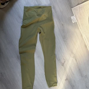 Lululemon InStill High-Rise Tight 25" verde bronzo taglia 4 - Foto 1 di 5
