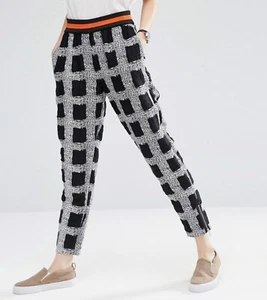 Pantalones Asos blancos a cuadros texturizados cremallera cónica tobillo negros elásticos para mujer 12 - Imagen 1 de 13