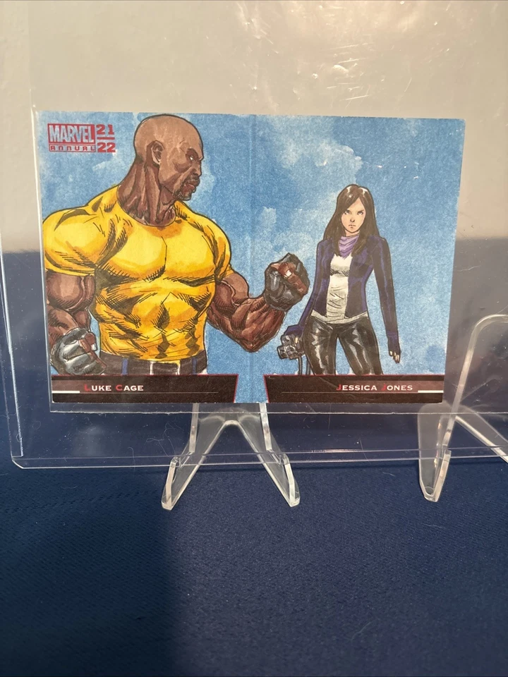 2021-22 Marvel Annual Battle Booklet Luke Cage V Jessica Jones By Abdul Ghofer - Image 1 of 3
