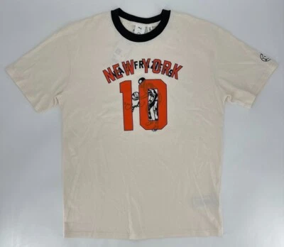Camiseta Puma Para Hombre Mediana Rhuigi Gráfico Camiseta Crema Nueva York Clyde Retro 539505 65 Foto 1 de 4